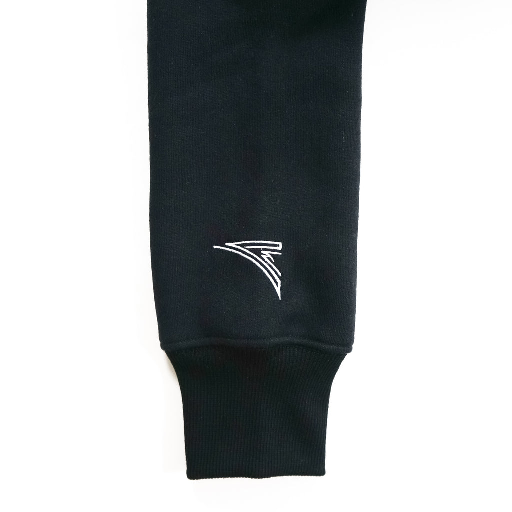 black sleeve with a AmSTRONG embroidered logo